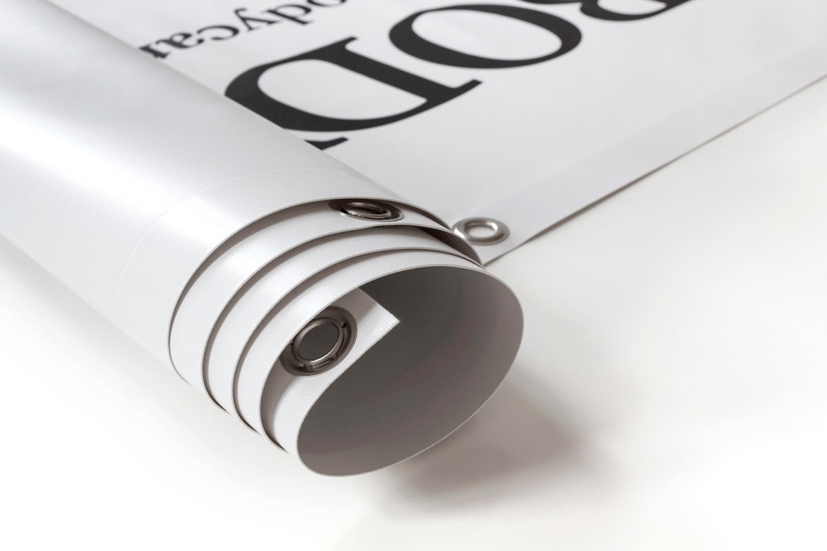Rolled vinyl banner with grommets