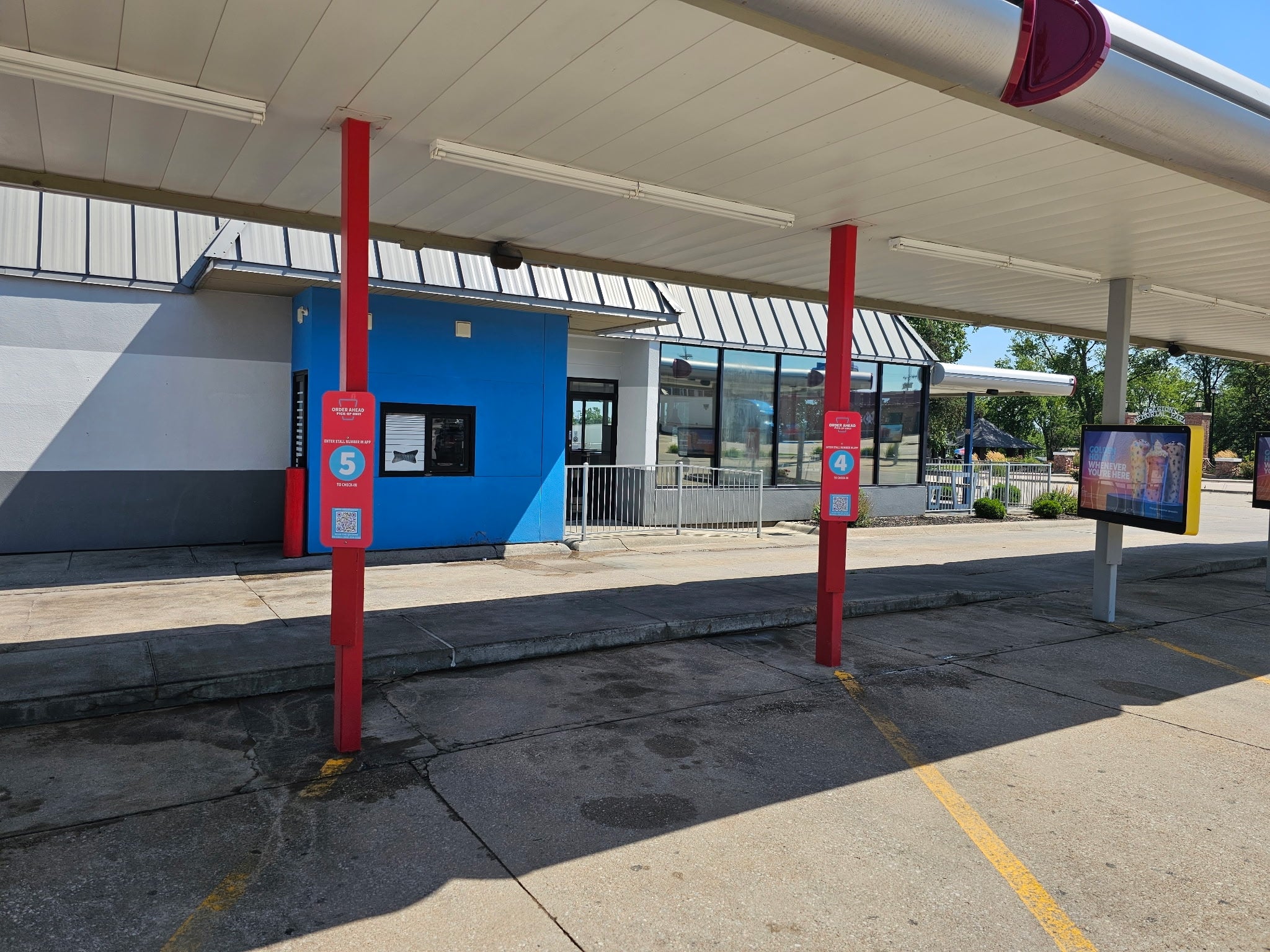 Sonic Drive-In — order-ahead stall signs, installed