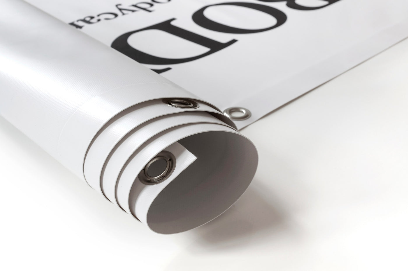 Rolled vinyl banner with grommets